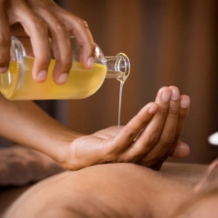 Traditional Ayurvedic full body massage with herbal oils